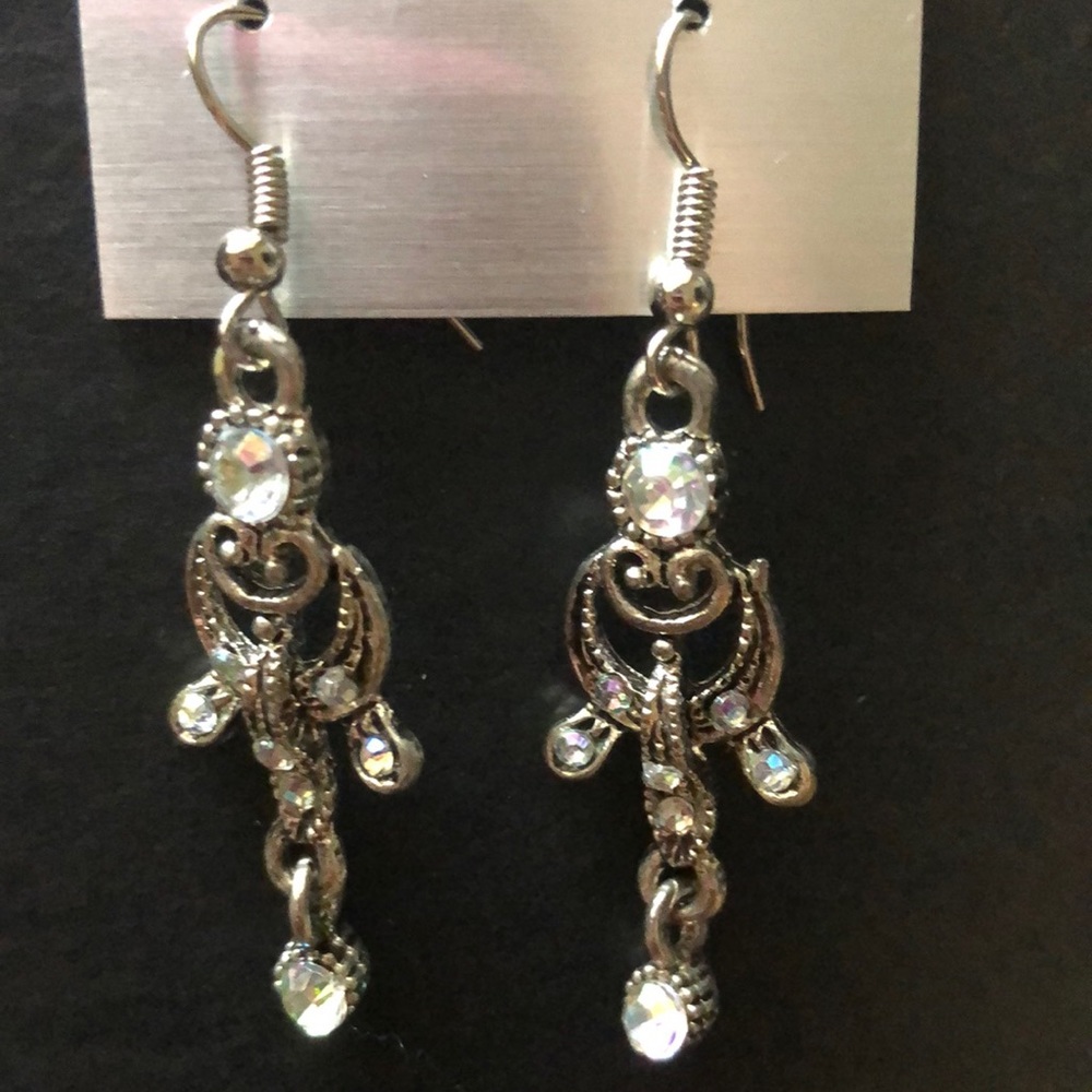 Brand new silver and white dangling earrings